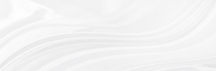 White gray satin texture that is white silver fabric silk panorama background with beautiful soft blur pattern natural.