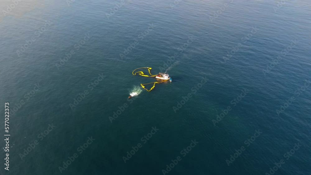 Boat Drags Fishing Boat Net In Mid-Ocean To Catch Tuna
