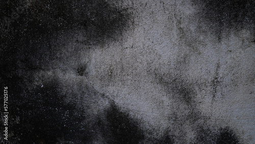 Dirty stains on an old concrete wall (spot focus)