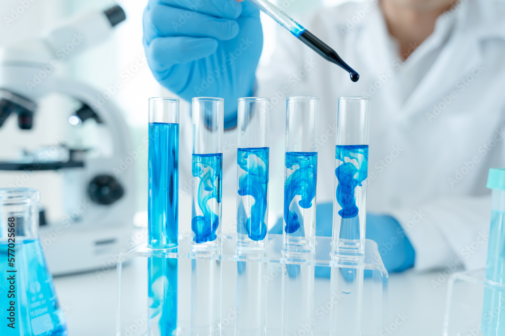 Scientist analyze biochemical samples in advanced scientific laboratory. Medical professional use dropper mix microbiological developmental of viral. Biotechnology research in science lab. cosmetic Scientist analyze biochemical samples in advanced scientific laboratory. Medical professional use dropper mix microbiological developmental of viral. Biotechnology research in science lab. cosmetic
