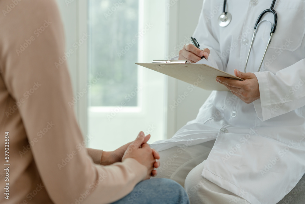 woman with mental health problems is consulting. psychiatrist is recording the patient's condition for treatment. encouragement, love and family problem, bipolar , depression patient, protect suicide woman with mental health problems is consulting. psychiatrist is recording the patient's condition for treatment. encouragement, love and family problem, bipolar , depression patient, protect suicide