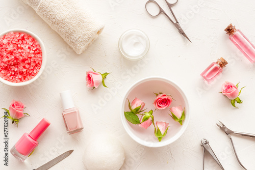 Manicure accessories with pink roses flowers. Beauty care salon spa.