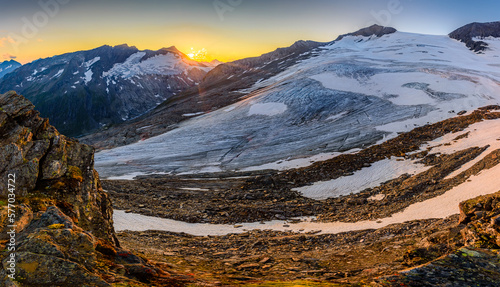 A setting sun above the Inneres Mullwitzkees glacier in High Tauern national park in Austria.