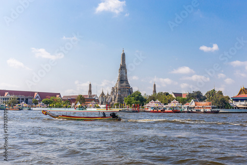 Photography Wat Arun with the Chao Phraya River and boats in front is a popular destination for tourists around the world