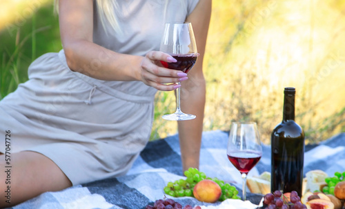 picnic in nature, girl pouring wine, couple in love. nature.