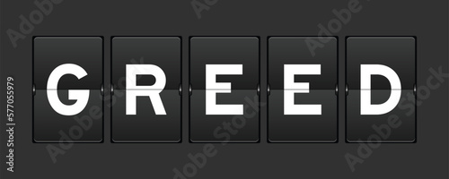 Black color analog flip board with word greed on gray background