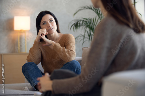 Psychologist session. A middle aged woman in therapy with an woman psychologist. photo