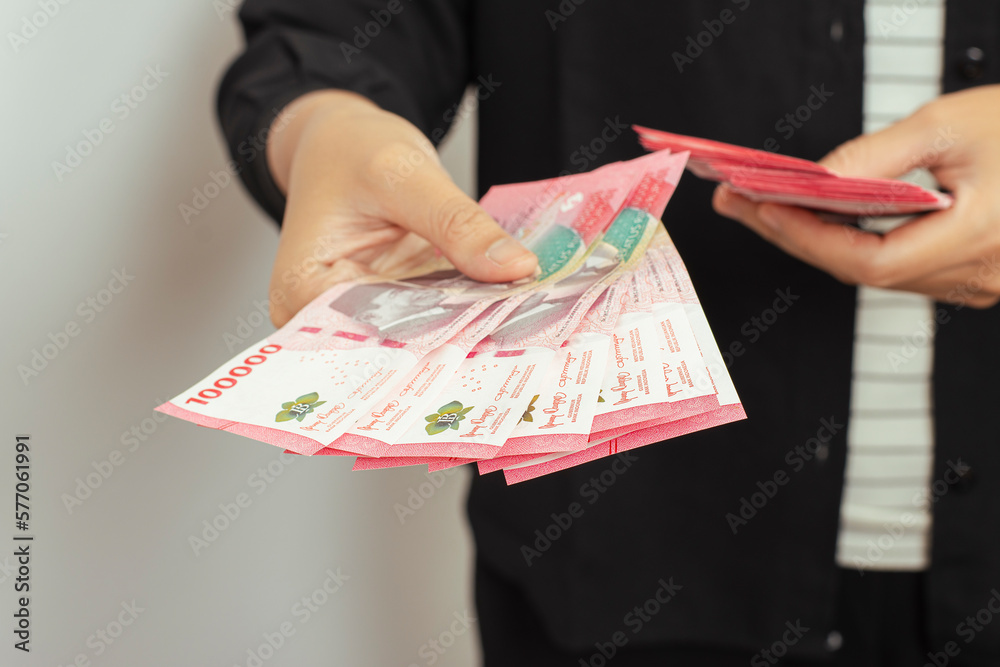 cash-payment-concept-indonesian-rupiah-currency-rp-100-000-seratus