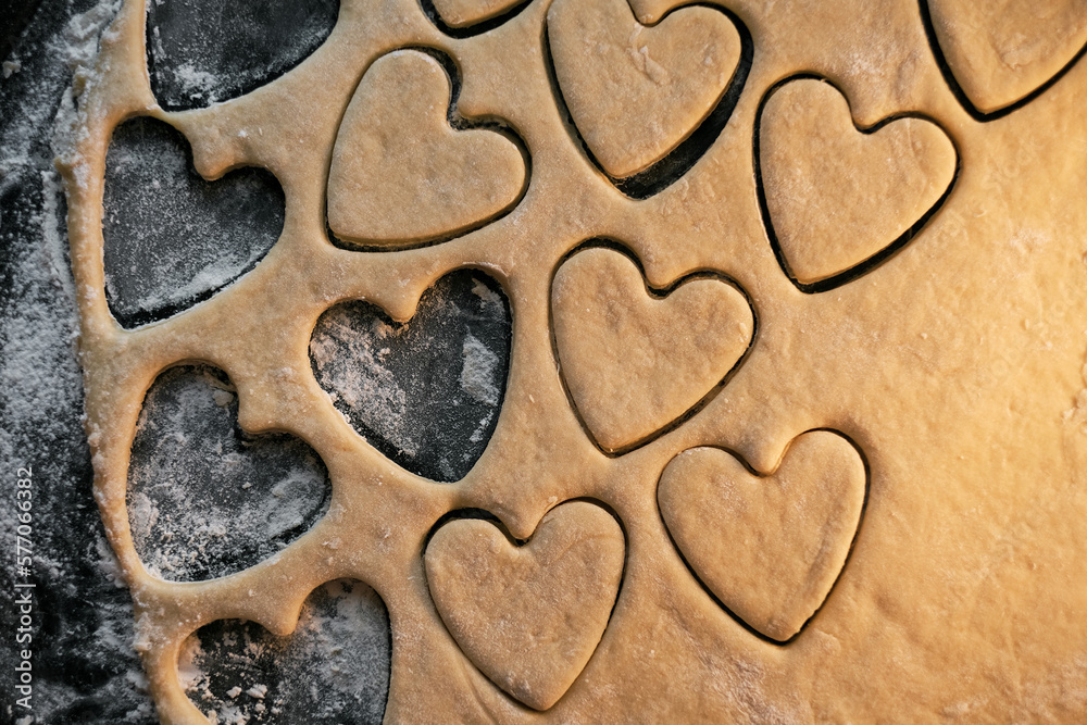 cooking heart shaped cookies in dough closeup cooking heart shaped cookies in dough closeup