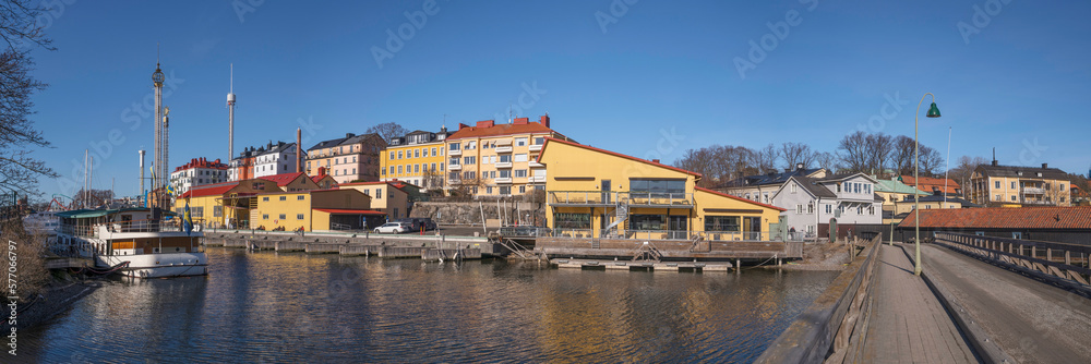 Old boat shops at the canal Beckholmskanalen, a spring day in Stockholm