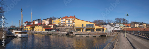 Old boat shops at the canal Beckholmskanalen, a spring day in Stockholm