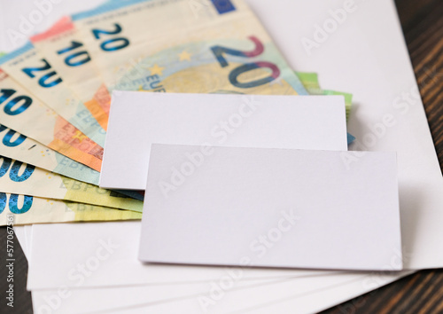 Euro banknotes on sheets of paper