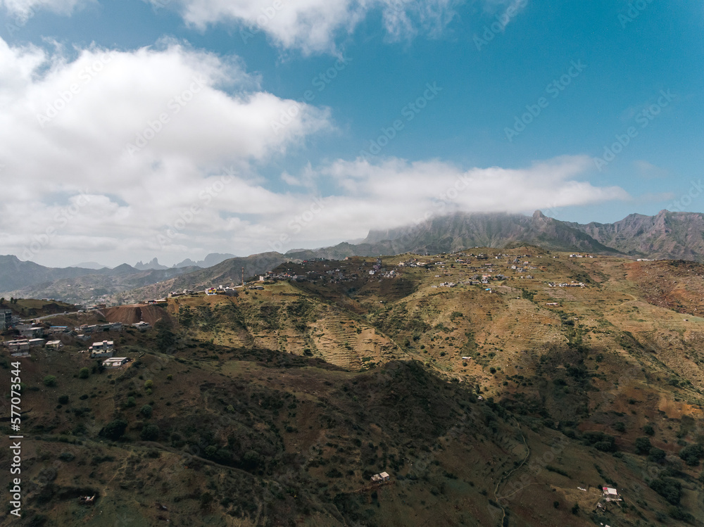 Aerial photos of Assomada in Santiago Island, Cabo Verde, reveal the vibrant culture, colorful markets, and stunning mountain landscapes of this historic town. The bird's-eye view captures the essence