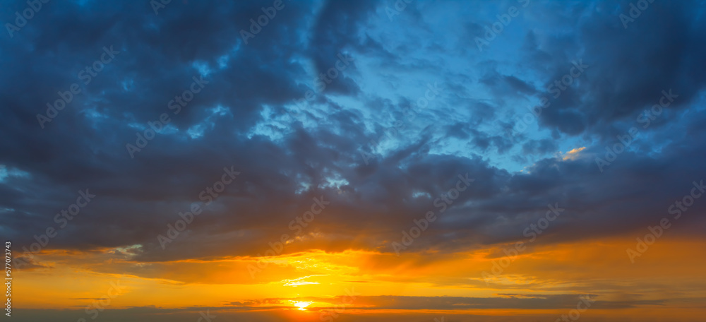 dense cloudy sky at the dramatic sunset, beautiful natural evening sky background