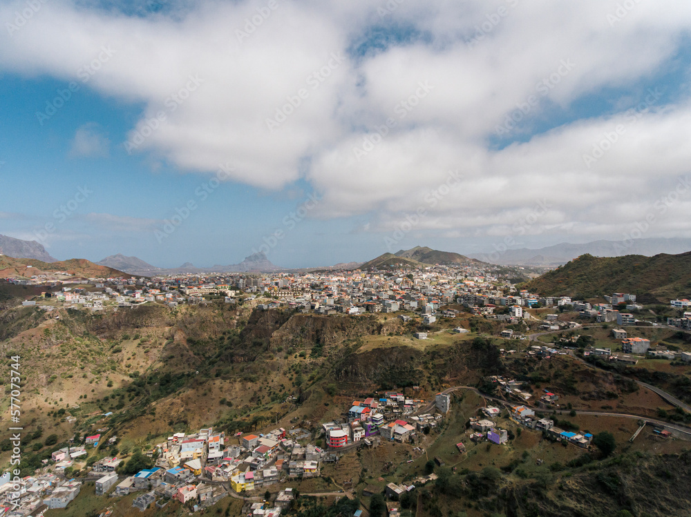 Aerial photos of Assomada in Santiago Island, Cabo Verde, reveal the vibrant culture, colorful markets, and stunning mountain landscapes of this historic town. The bird's-eye view captures the essence