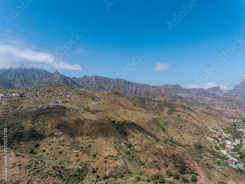 Aerial photos of Assomada in Santiago Island, Cabo Verde, reveal the vibrant culture, colorful markets, and stunning mountain landscapes of this historic town. The bird's-eye view captures the essence