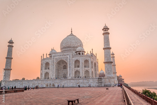 The Taj Mahal is an ivory-white marble mausoleum on the south bank of the Yamuna river in the Indian city of Agra, Uttar Pradesh. photo