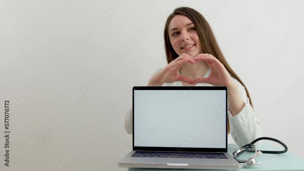 doctor nurse near computer with white screen blank space for text shows with hands heart smiling nutritional supplements good medicine mutual help excellent treatment medicine product advertisement doctor nurse near computer with white screen blank space for text shows with hands heart smiling nutritional supplements good medicine mutual help excellent treatment medicine product advertisement