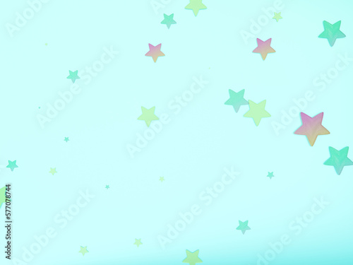 Pastel-toned yellow, green and pink stars scattered on a pale blue-green background