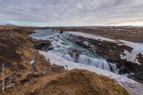View on Gullfoss waterfall with ice and snow during winter, Bláskógabyggð ( Blaskogabyggd ) commune, Iceland
