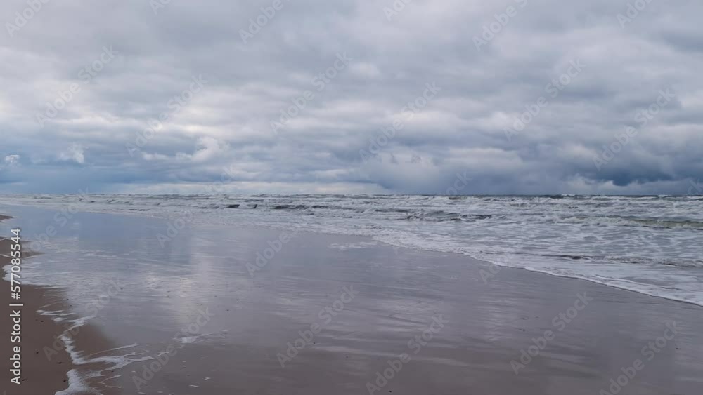 Sandy beach and blue sky in winter on Baltic Shore. natural sound. Leba, Poland, Europe Sandy beach and blue sky in winter on Baltic Shore. natural sound. Leba, Poland, Europe
