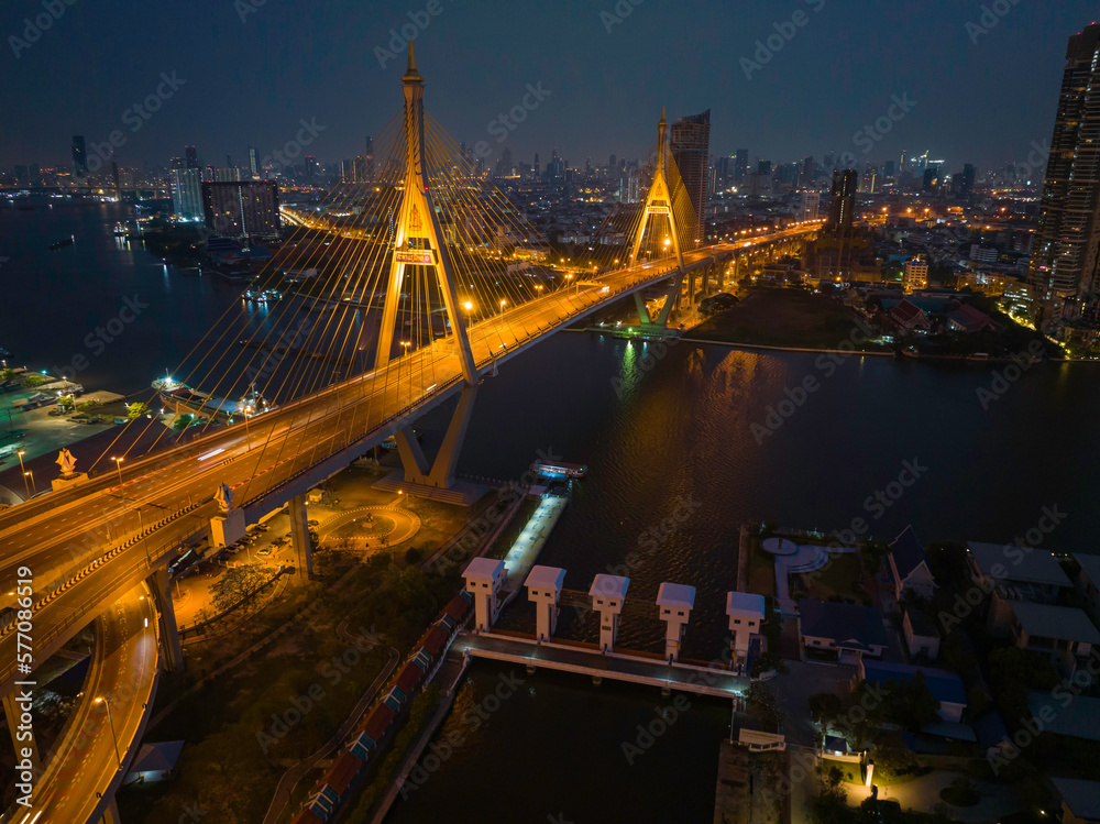 Fototapeta premium Bridge view from the top view of Thailand, Beautiful bridge, and river landscapes bird's eye view during sunset