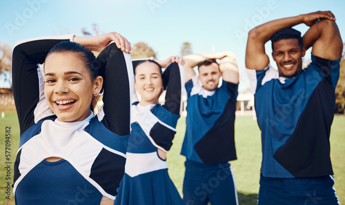 Cheerleader training or portrait of team stretching on a outdoor stadium field for fitness exercise. Cheerleading group, sports workout or happy people game ready for cheering, match or campus event