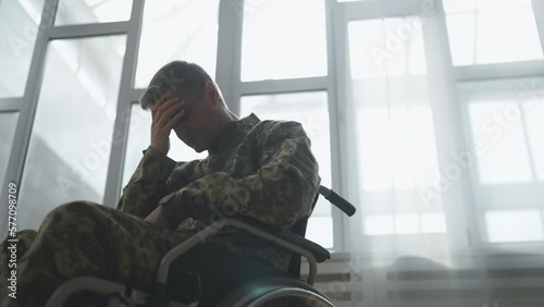 Soldier with disability feeling depressed, post traumatic stress disorder photo