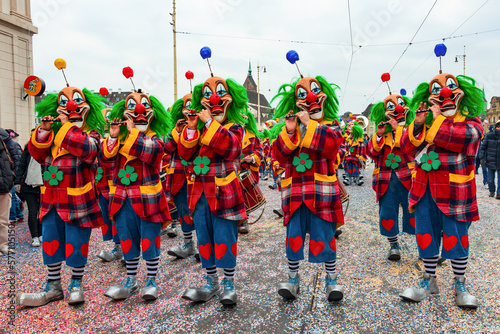 Basel Fasnacht, street costume carnival with flutes, drummers and confetti, people and children in masks
