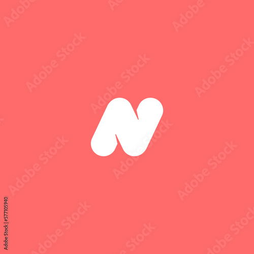 letter n embossed logo on pink background