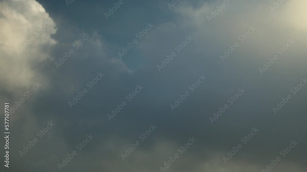 Fast-moving rain clouds, timelapse with cumulus clouds background. Fast-moving rain clouds, timelapse with cumulus clouds background.