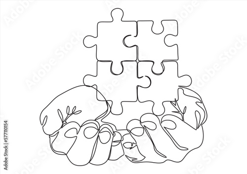 One continuous line drawing of two hands holding puzzle pieces to unite them as sign to start business collaboration. Jigsaw wooden puzzle on white background. Concept of connection