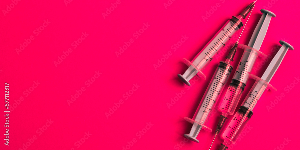 Disposable plastic syringe prepared for injection and vaccination in the hospital. The concept of medicine and health Disposable plastic syringe prepared for injection and vaccination in the hospital. The concept of medicine and health