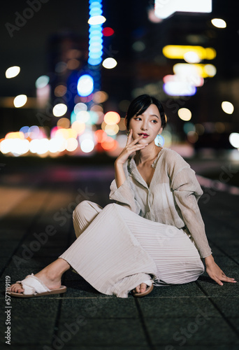 portrait of a girl in the city at night, 