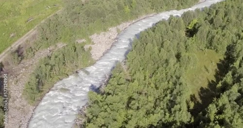 Aerial view of Gievdanjohka river that starts at Steindalsbreen glacier in summer, Steindalen, Norway.