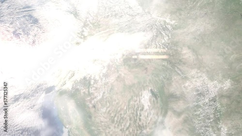 Earth zoom in from outer space to city. Zooming on Kuna, Idaho, USA. The animation continues by zoom out through clouds and atmosphere into space. Images from NASA photo