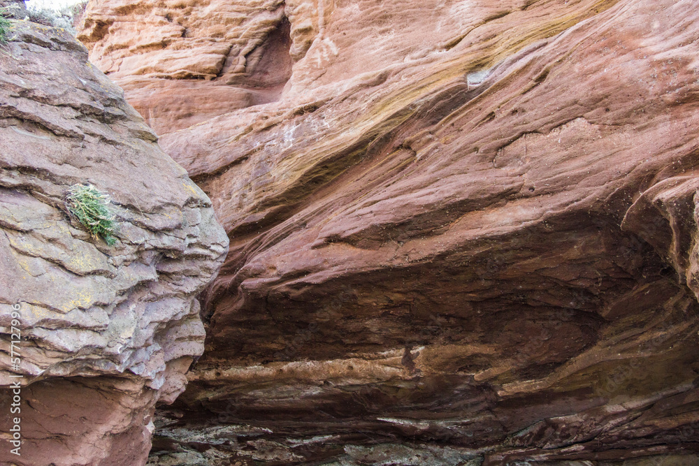 a large rock formation on rocky coastline, wonder of nature. waves in the process of erosion eroded the rock a large rock formation on rocky coastline, wonder of nature. waves in the process of erosion eroded the rock
