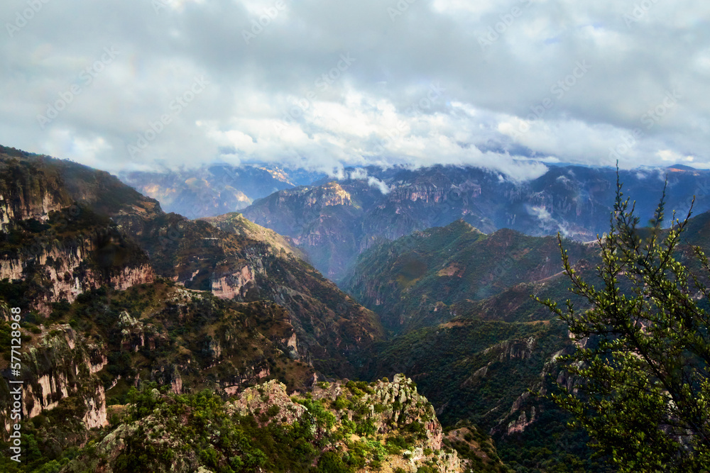 mountains in winter with cloudy sky , copper canyon with clouds of rain in divisadero, chihuahua mexico 