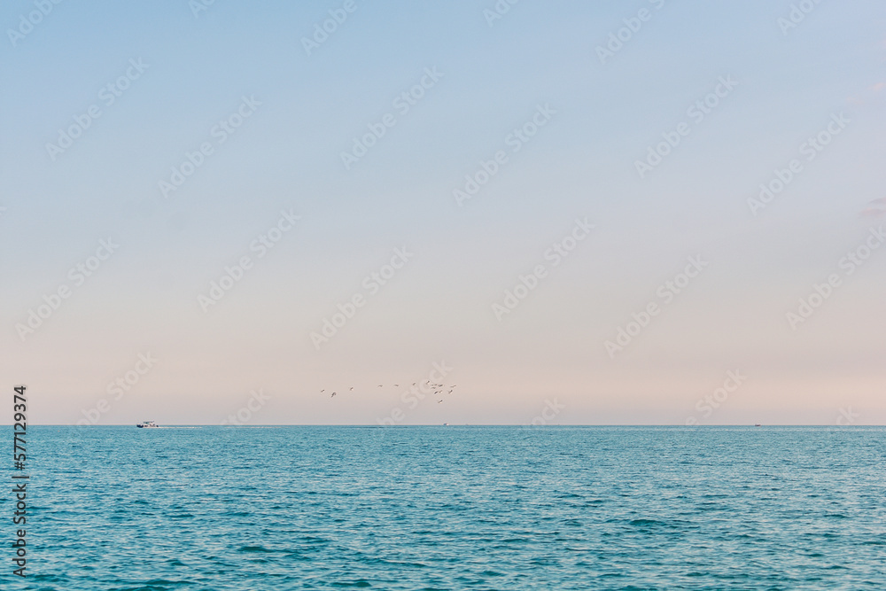 The horizon of the sea and sky during sunset. Sea horizon in pastel colors. The horizon of the sea and sky during sunset. Sea horizon in pastel colors.