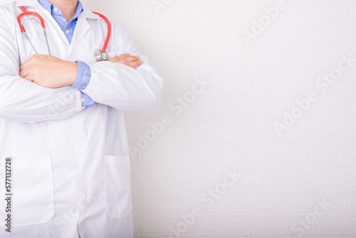 Doctor Standing on front of wall for WORLD HEALTH DAY or DOCTOR Day