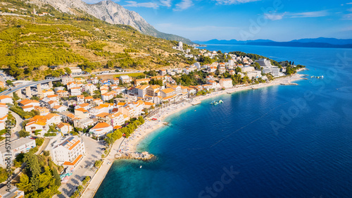 Fototapeta Naklejka Na Ścianę i Meble -  Get lost in the picturesque scene of Croatia's beach, with its stunning turquoise waters and pristine coastline. From above, the aerial view showcases the perfect spot for a vacation and adventure.
