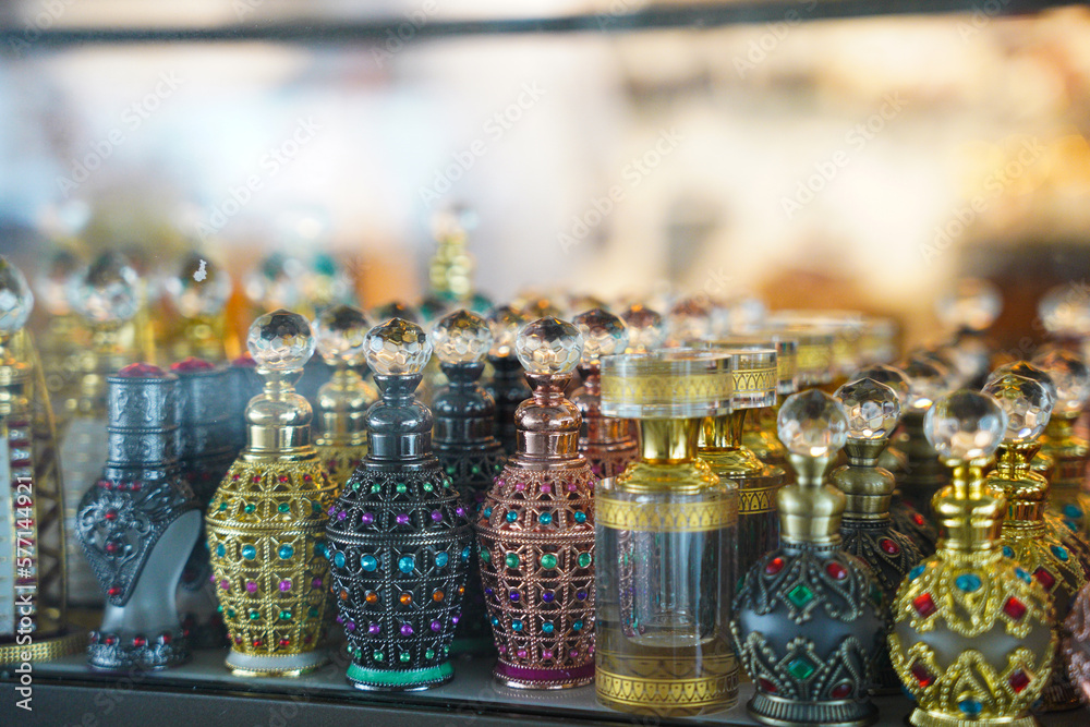 Oud bottles or perfume on display at the gift shop souvenir, arab souvenirs are traditional nice bottles with many different colours and shape.      