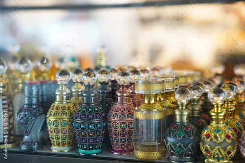 Oud bottles or perfume on display at the gift shop souvenir, arab souvenirs are traditional nice bottles with many different colours and shape. 