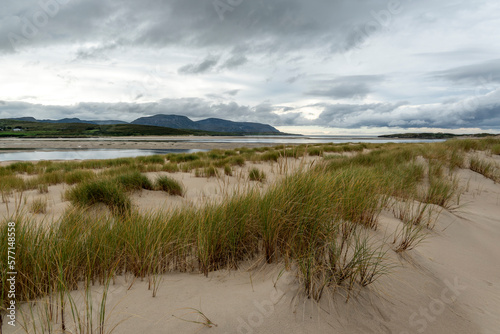 View over grassy sand dunes towards Ballinreavy Strand, Kiltoorish, County Donegal, Ireland