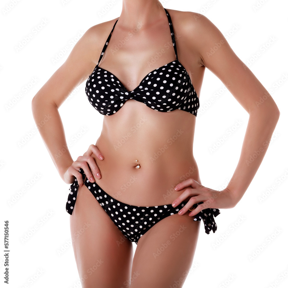 Sexy woman in bikini suit with polka dot pattern. Isolated on white background Sexy woman in bikini suit with polka dot pattern. Isolated on white background