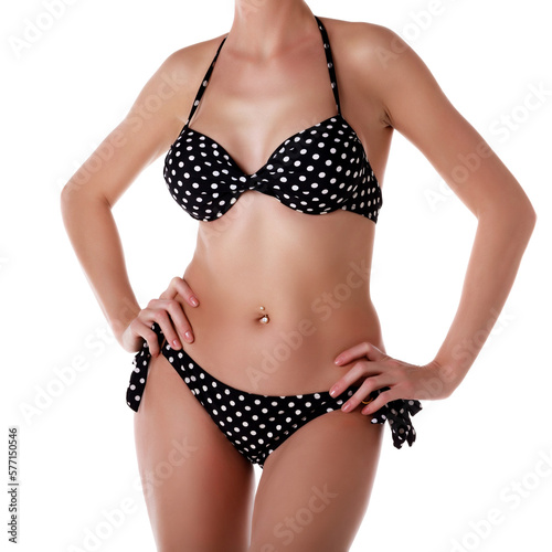 Sexy woman in bikini suit with polka dot pattern. Isolated on white background