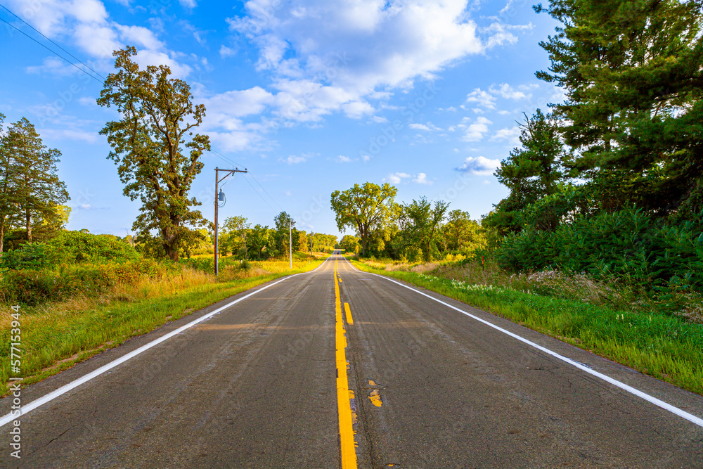 Fototapeta premium Country Road With Blue Sky