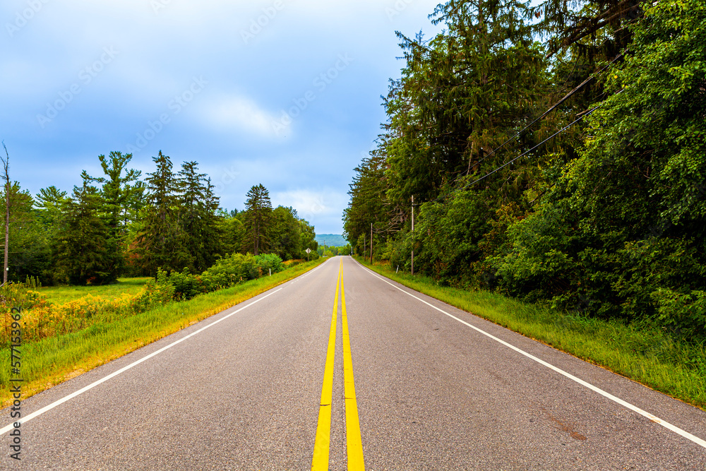 Fototapeta premium Country road in rainy weather