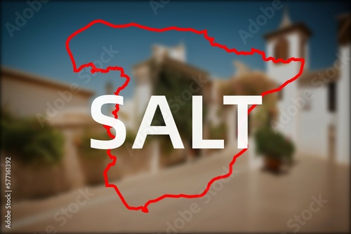 Salt: Der Name der spanischen Stadt Salt in der Region Catalonia vor einem Hintergrundbild photo