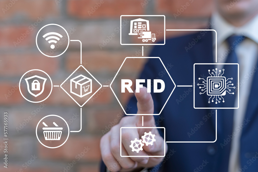 Man using virtual touchscreen presses acronym RFID. Concept of RFID